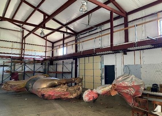 Statue in warehouse.png